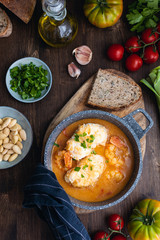 Mediterranean catalan cuisine ingredients, shrimps, raw monkfish, tomatoes, garlic, almonds, olive...