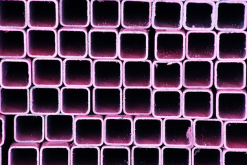 stack of colorful square metal pipe background