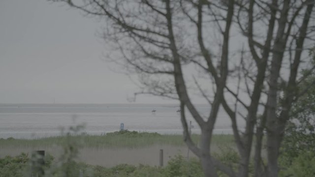 Equestrians/Horsewoman riding horses in the mud of the German north sea coast