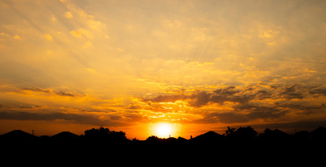 The setting sun and free space in the sky.