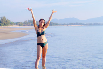 Fototapeta na wymiar Woman body pretty show bikini on beach