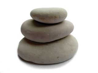 Fototapeta na wymiar pile of stones isolated on white background. zen stone for spa background. three zen stones isolated on white background.