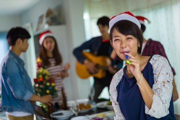 Group of teens asian is celebrate the christmas and happy new year party