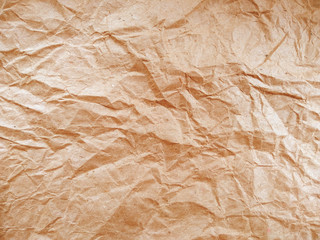 Obraz premium Crumpled paper ball isolated on white background. Crumpled paper texture. Brown crumpled paper texture for background.