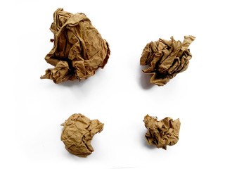 Crumpled paper ball isolated on white background. Crumpled paper texture. Brown crumpled paper texture for background.