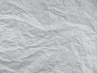 Crumpled paper ball isolated on white background. Crumpled paper texture. White crumpled paper...