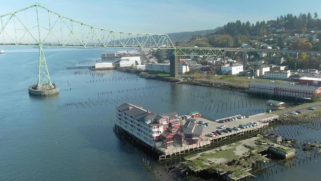 Aerial flying over the Cannery Pier Hotel & Astoria-Megler bridge that spans the Columbia River. Astoria, Oregon. USA. 4 November 2019