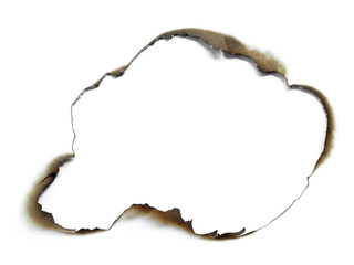 Collection of burnt holes in a piece of paper isolated on white background. Fire holes in white paper.
