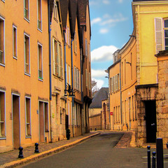 orange buildings and empty street