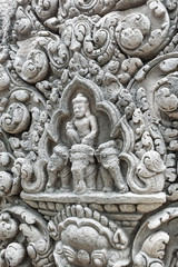 Fototapeta na wymiar Khmer art sculpture on sand stone in Prasat Muang Tam.