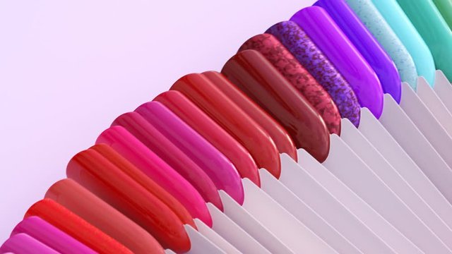Seamless looping animation of nail polish arranged in a circle. Bright colours.