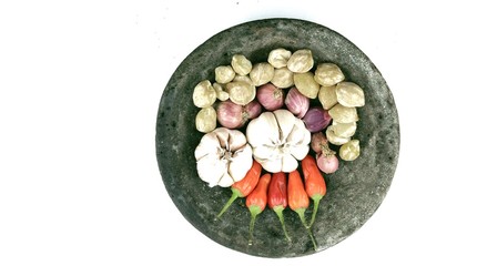 Obraz na płótnie Canvas kitchen spices namely chili, onion, garlic and hazelnut