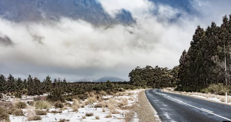 Wall murals Cradle Mountain Murchison Highway With Snow Covered Cradle Mountain Tasmania