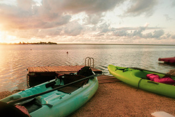 Kayaks in the sunrise