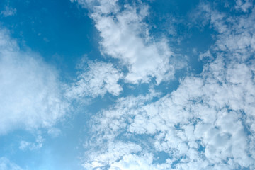 details of white clouds on blue sky, background of beautiful sky on sunny day