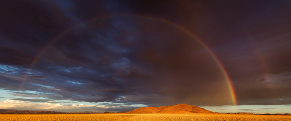 rainbow over the namib desert