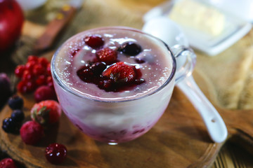 milk yogurt with berries and jam.