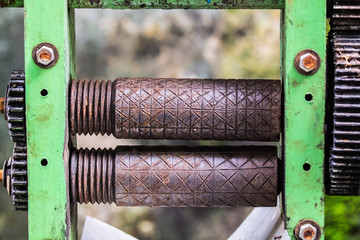 Old rusty axle shaft of sugarcane juice machine manual