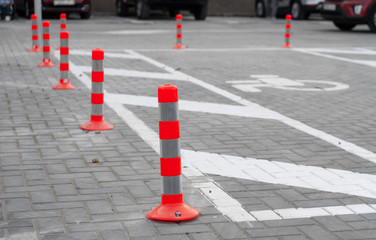 orange Parking columns.Protection on the road, concept