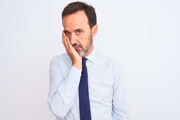 Middle age businessman wearing elegant tie standing over isolated white background thinking looking tired and bored with depression problems with crossed arms.