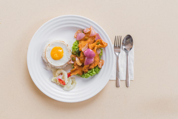 Flat lay, Asian Chinese food, Stir-fried sweet spicy fish with rice and sunny side egg