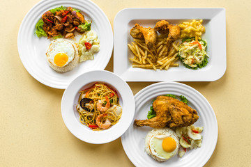 Flat lay view of various dishes of Asian Chinese Western food