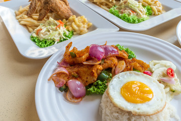 Asian Chinese food, Stir-fried sweet spicy fish with rice and sunny side egg