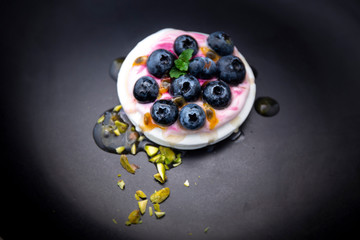 Dessert Pavlova of meringue with fresh fruit