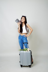 Attractive asian tourist woman with luggage