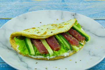 Sandwich with red fish, cottage cheese and cucumbers