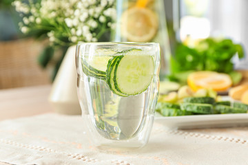 Glass of healthy infused water on table