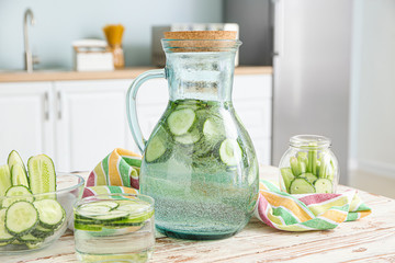 Healthy infused water on table in kitchen