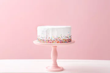 Fotobehang Tasty Birthday cake on table against color background © Pixel-Shot