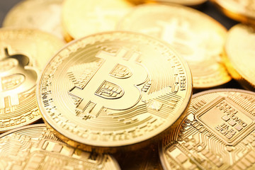 Many golden bitcoins, closeup view