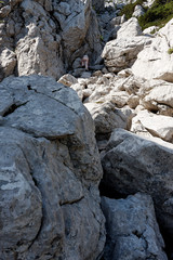 Fototapeta na wymiar Climbing on the rocks in Velebit mountain, Croatia