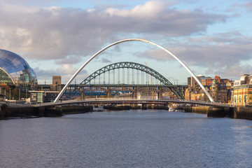 Fototapeta na wymiar Gateshead Millennium and Tyne Bridge over the River Tyne, Newcastle, UK