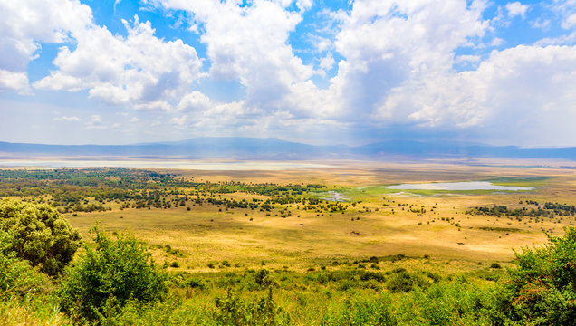 Panorama of Ngorongoro crater National Park with the Lake Magadi. Safari Tours in Savannah of Africa. Beautiful landscape scenery in Tanzania, Africa