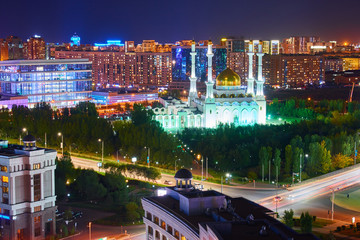 Fototapeta na wymiar Evening view of the city of Nur Sultan. Nur-Sultan is the capital of Kazakhstan. Center of the Nur-Sultan city.
