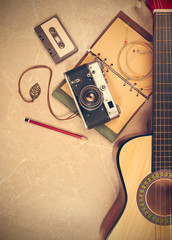 Fototapeta premium Retro still life with guitar in flat lay style.