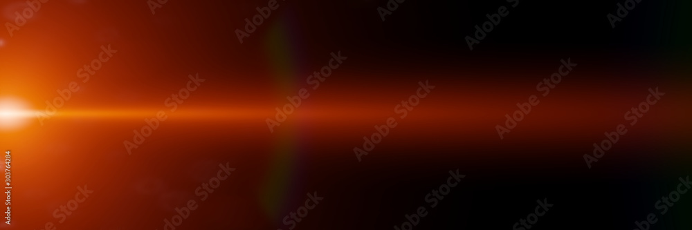 Wall mural abstract orange lens flare effect overlay texture with bokeh effect and light streak in front of a b
