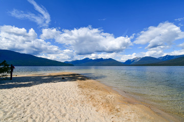 beautiful Sandy Point beach in the mountains, Wavy Range, still beautiful water in the wilderness of Murtle Lake, British Columbia. Very remote and tranquil.