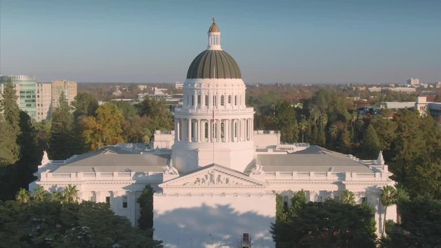 Aerial: flying above the California State Capitol building. Sacramento, California, USA. 11 November 2019.