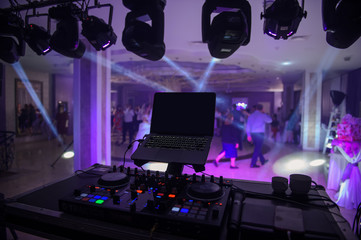 close up photo of a mixing desk in the dark at a wedding - obrazy, fototapety, plakaty