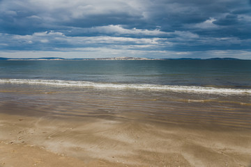 Fototapeta na wymiar pristine natural beach in Tasmania, Australia with no people