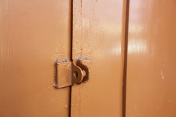 The ancient key ring of a wooden house in Thailand