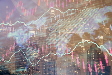 Double exposure of forex chart drawings over cityscape background. Concept of success.