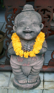 Smiling little Buddha statuette, Thailand