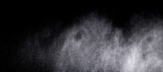 Texture of a snowstorm isolated on a black background, Clusters of stars in space, dynamic scattering of particles - 303777643