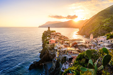 Vernazza - Village of Cinque Terre National Park at Coast of Italy. Beautiful colors at sunset. Province of La Spezia, Liguria, in the north of Italy - Travel destination and attraction in Europe.
