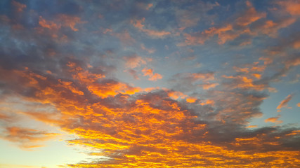 Fiery sunrise sky background